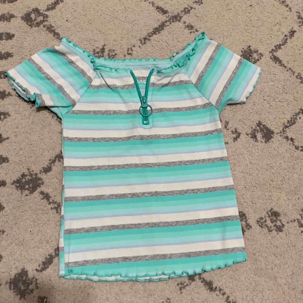 Girls justice top, teal stripe and zipper at top.